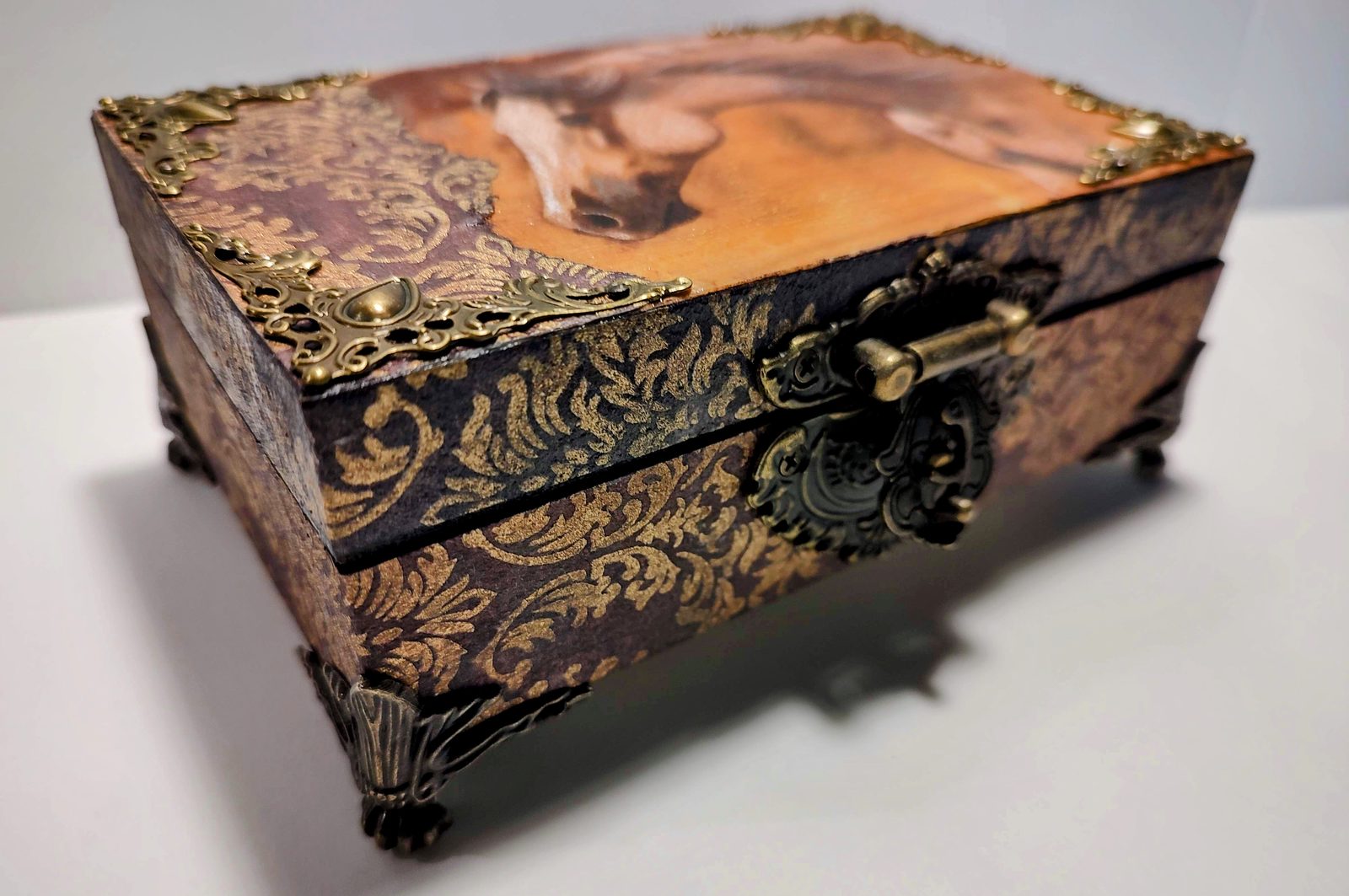 Baroque painted box — corner detail of the antique hardware
